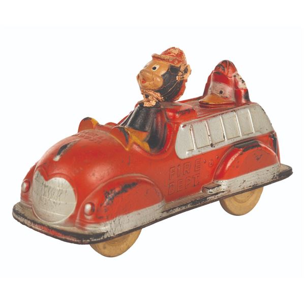 A Mickey And Donald Toy Fire Truck.