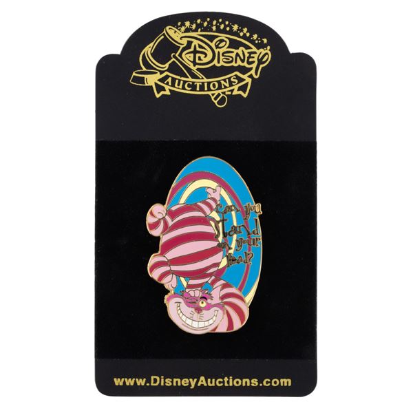 A Disney Auctions Cheshire Cat Pin.