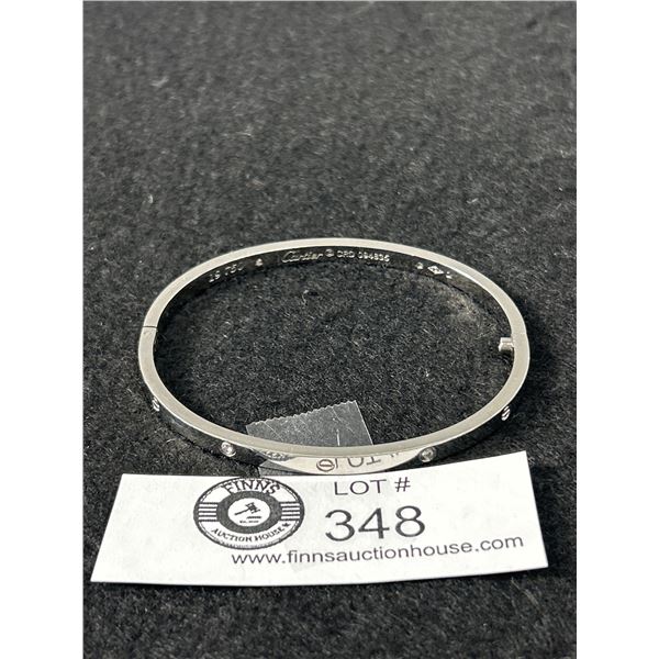 Cartier Hinged Bangle Replica Marked 19 750 Cartier © CRD 094835 Hallmark, Good Condition, One Screw