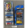 Image 1 : 2 Packages of Hot Wheels. ( 9 Cars in Total) With Bonus Hot Wheels Book
