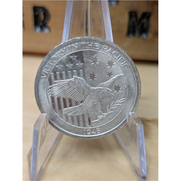 Lot 59-1) 1/2 oz australian Victory in the pacific silver