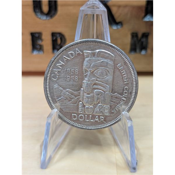Lot 53-1) 1958 Canadian silver 1 Dollar BC