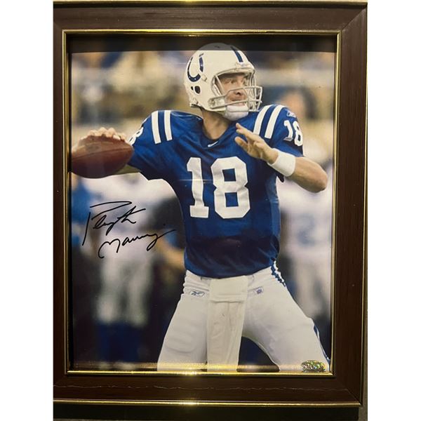 Peyton Manning signed photo. SCM authenticated