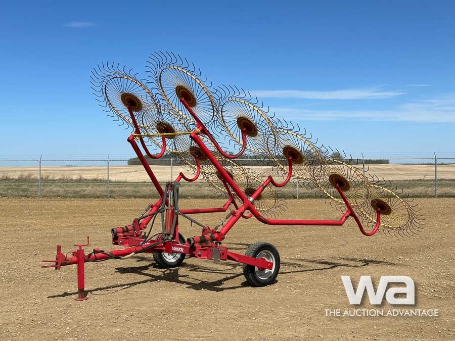 TONUTTI 10 WHEEL HAY RAKE - Weaver Bros. Auctions Ltd.