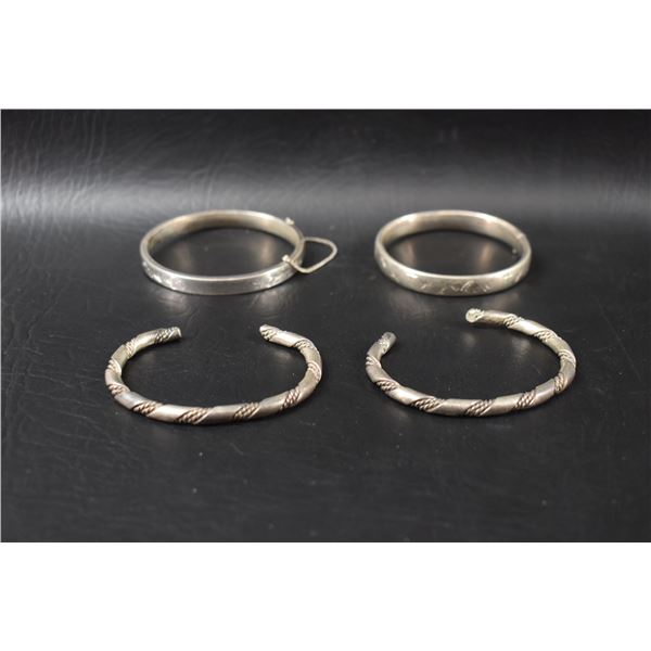 FOUR STERLING SILVER BRACELETS