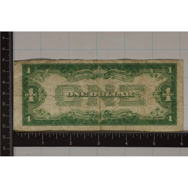 1934 US $1 SILVER CERT "FUNNY BACK" BLUE SEAL