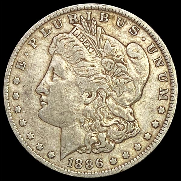1886-O Morgan Silver Dollar NEARLY UNCIRCULATED