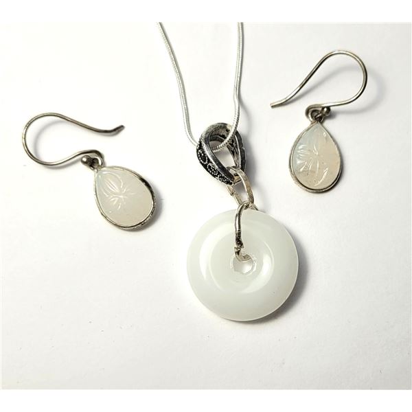 19)  NATURAL WHITE JADE DONUT PENDANT ON 18"