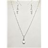 21)  SET OF CLEAR SWAROVSKI CRYSTAL PENDANT ON