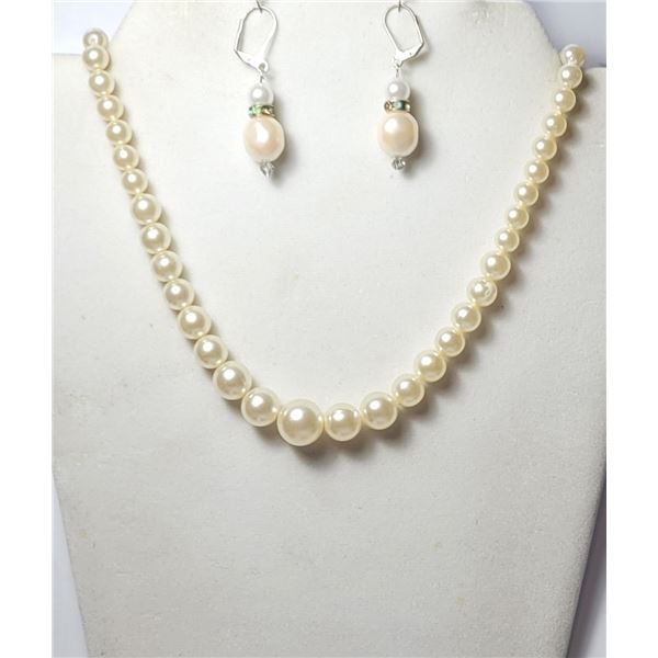 20)  STRAND OF 22" GRADUATED PEARLS WITH A