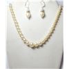 20)  STRAND OF 22" GRADUATED PEARLS WITH A
