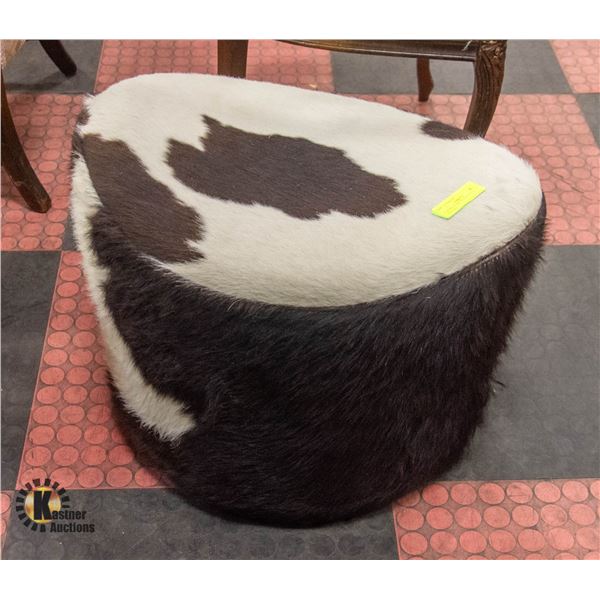 COW PRINT SWIVELING OTTOMAN (APPEARS TO BE