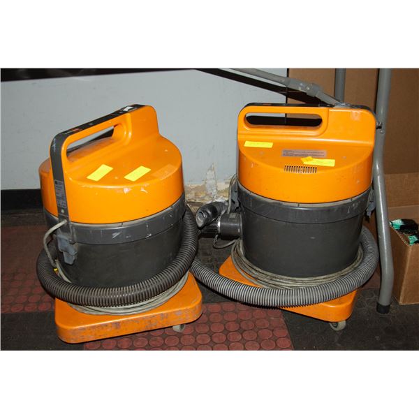 TWO TASKI BORA WORKING CANISTER VACUUMS