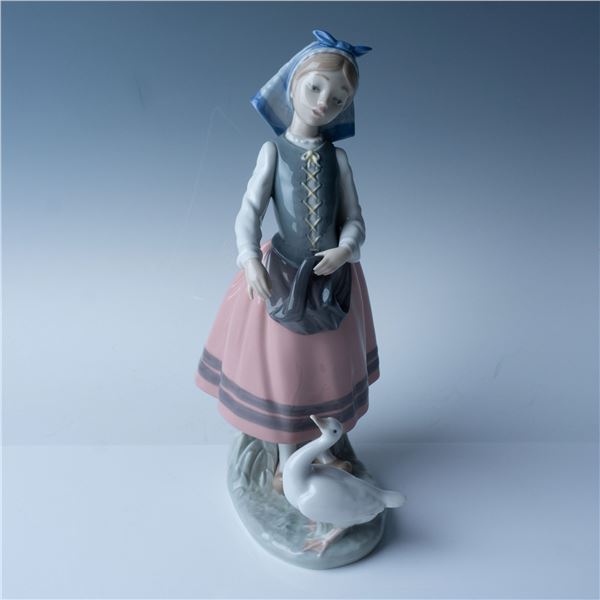 Lladro Porcelain Figurine, Josepha Feeding Duck 1005201