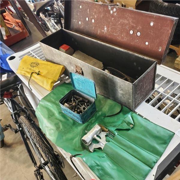 METAL TOOLBOX OF VINTAGE LOGGING SUPPLIES