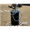 Image 2 : PARTIAL DRUM OF 5-30W OIL AND HAND PUMP