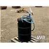 Image 3 : PARTIAL DRUM OF 5-30W OIL AND HAND PUMP