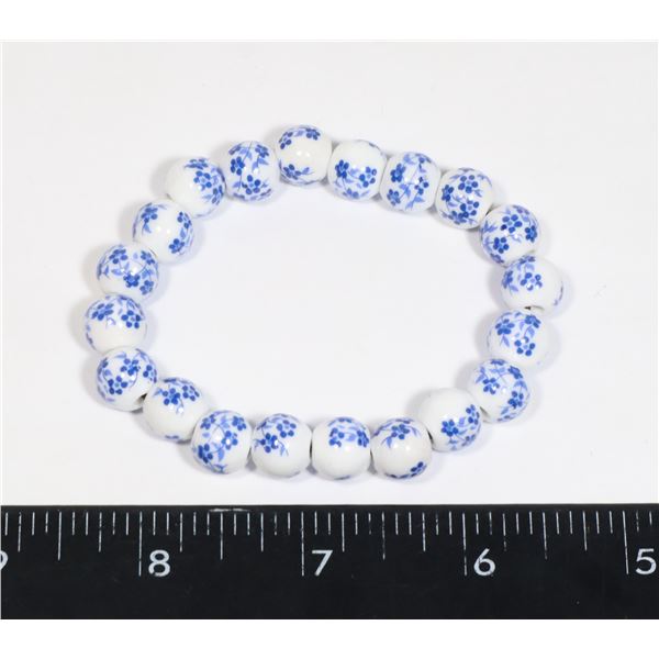 NEW BLUE FLOWER CERAMIC BEAD BRACELET