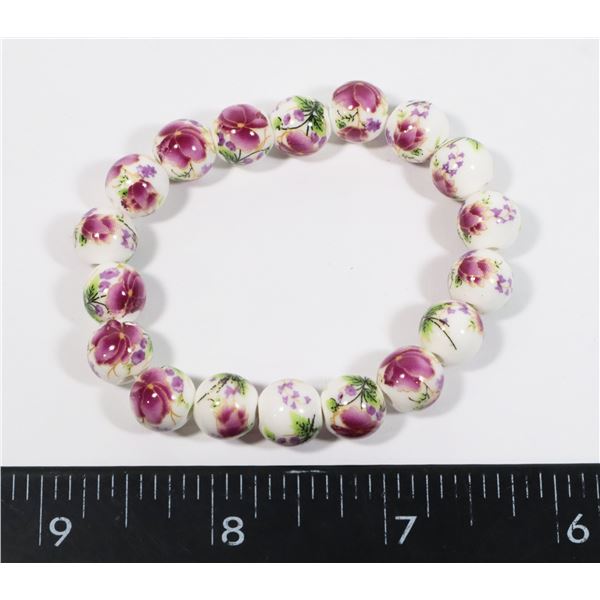 NEW PINK FLOWER CERAMIC BEAD BRACELET
