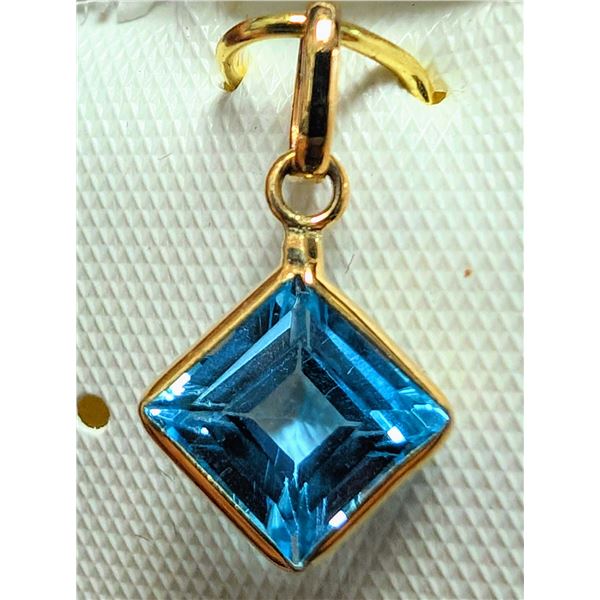 10K YELLOW GOLD BLUE TOPAZ 1.4CT  PENDANT