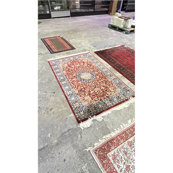 AREA RUG 76" X 49"