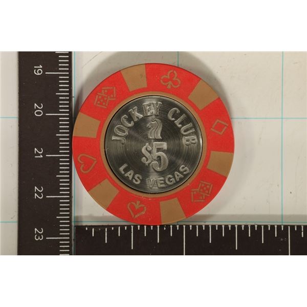$5 JOCKEY CLUB CASINO CHIP. WITH METAL INSERT