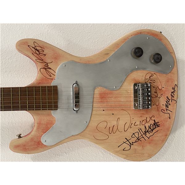 Rare Sex Pistols band signed guitar
