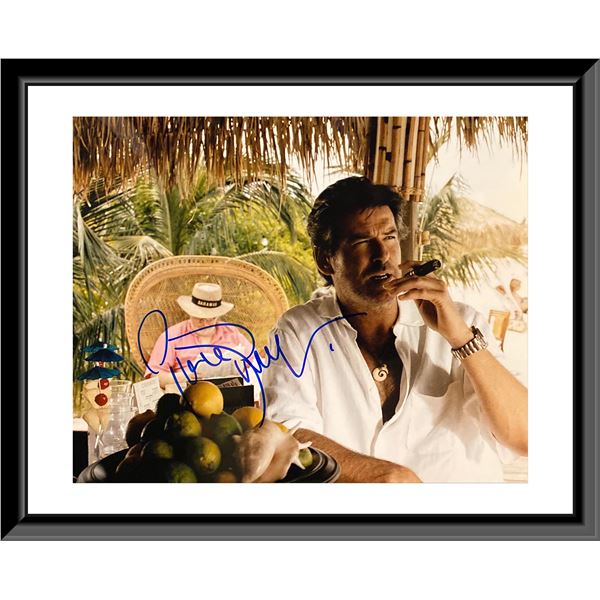 Pierce Brosnan signed  photo. 8X10 Inches