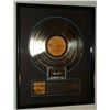 Image 1 : R.E.M. Platinum Metal Record & Cassette Award