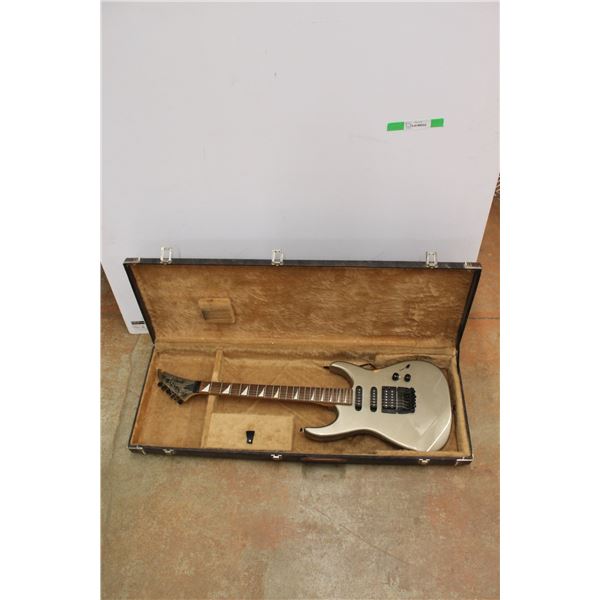*Electric Guitar and Case 41'' x 15'' - As Is