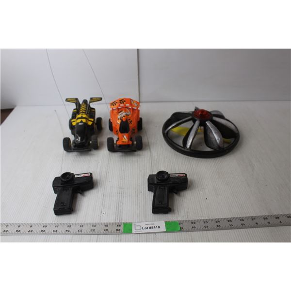 (2) RC Cars (Need Batteries) 7.25" Long with Remotes & Flying Saucer- Powers On, No Remote