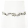 Image 2 : 18K Gold 7" 1.60 ctw Baguette Channel Set Diamond Dual Finish Wavy Link Bracelet