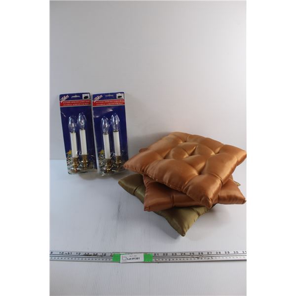 (4) Battery Operated Candle Lights and (3) 12'' x 12'' Cushions