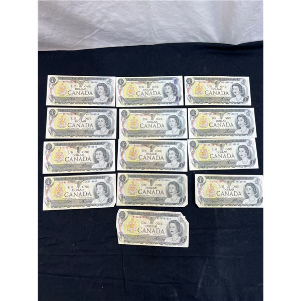13 Canadian $1.00 Bills
