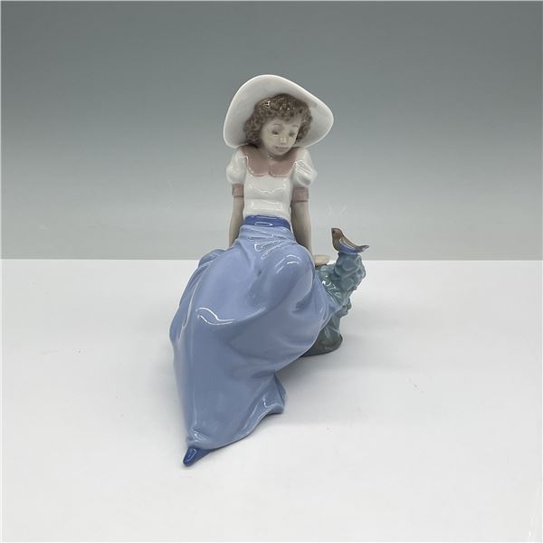 Nao by Lladro Porcelain Figurine, Girl Sitting w/Bird