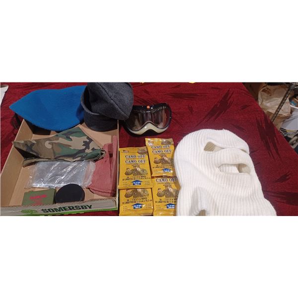 BOX WITH CAMO, FACE PAINT, WHITE BELACLAVA, HATS, SKI GOOGLES AND FACE PAINT REMOVER