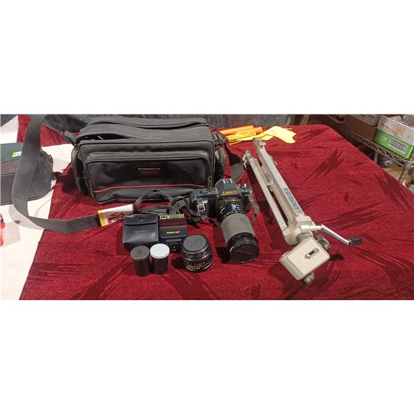 CANNON T50 CAMERA COMES WITH 80-200MM LENS, FLASH, 50MM LENS BAG.- TWO NEW ROLLS OF FILM AND TRIPOD
