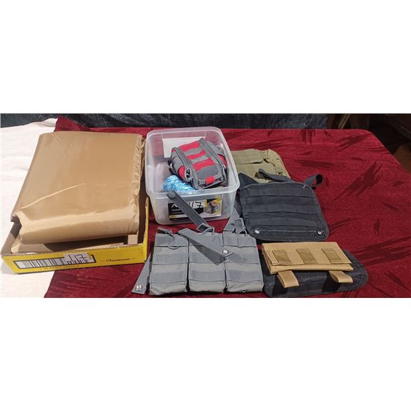 CONTAINER WITH ASSORTED POUCHES, STRAPS, AND AMO CLIP HOLDER