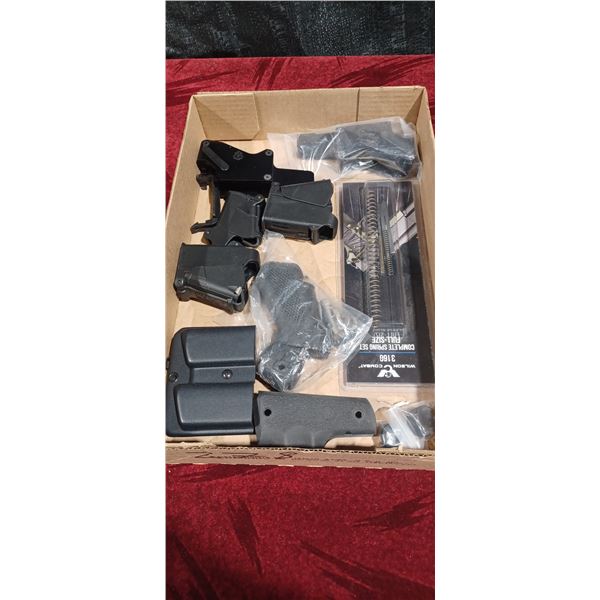 BOX WITH ASSORTED HANDGUN ACCESSORIES AND PARTS