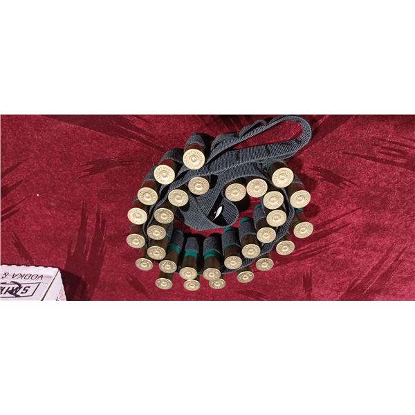 SHOTGUN AMMO BELT COMES WITH 15 .00BBUCK AND 15 SLUGS