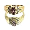 Image 1 : Intriguing Color-Changing Garnet and Diamond Ring