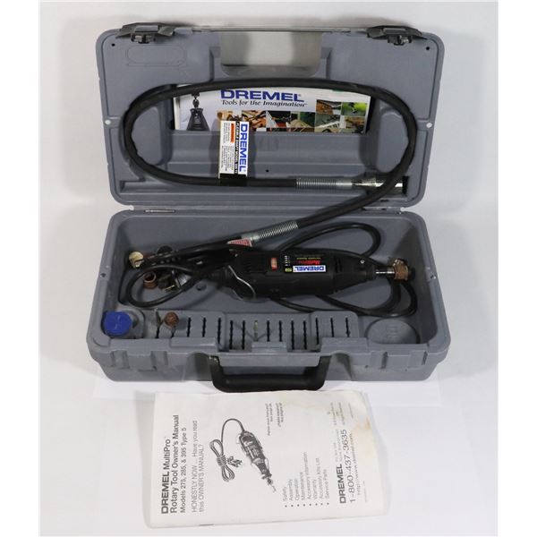 DREMEL ROTARY TOOL IN CASE WITH SOME BITS