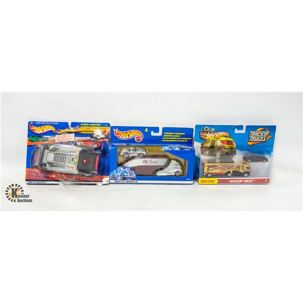 FLAT OF 3 HOTWHEELS 2 TRUCKS, POWER LAUNCHER