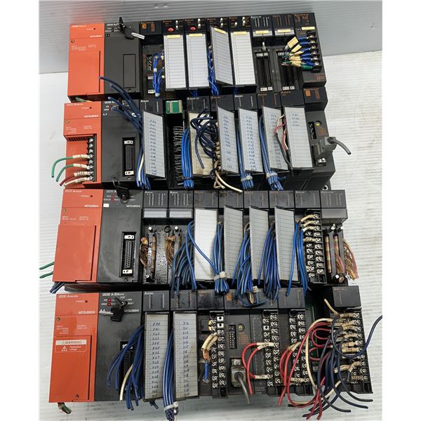 Lot of (4) Misc. Mitsubishi Racks w/Power Supplies & Modules as Pictured