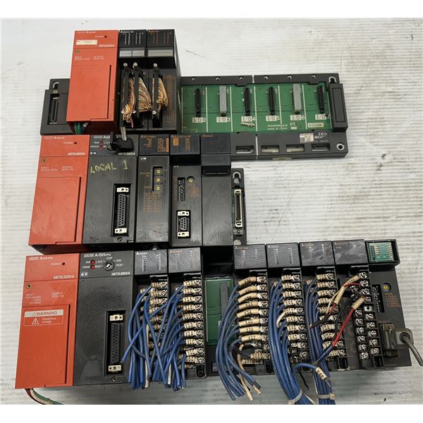 Lot of (3) Misc. Mitsubishi Racks w/Power Supplies & Modules as Pictured