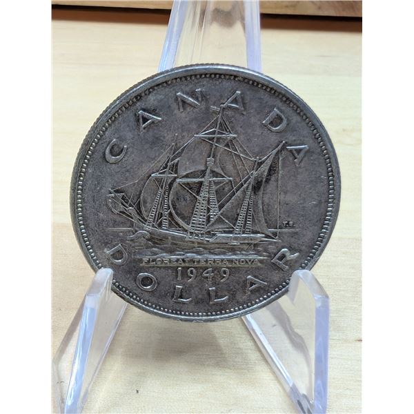 Lot 105-1) 1 Canadian silver Dollar 1949