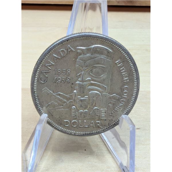 Lot 113-1) 1 Canadian silver Dollar 1958