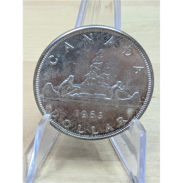 Lot 119-1) 1 Canadian silver Dollar 1963