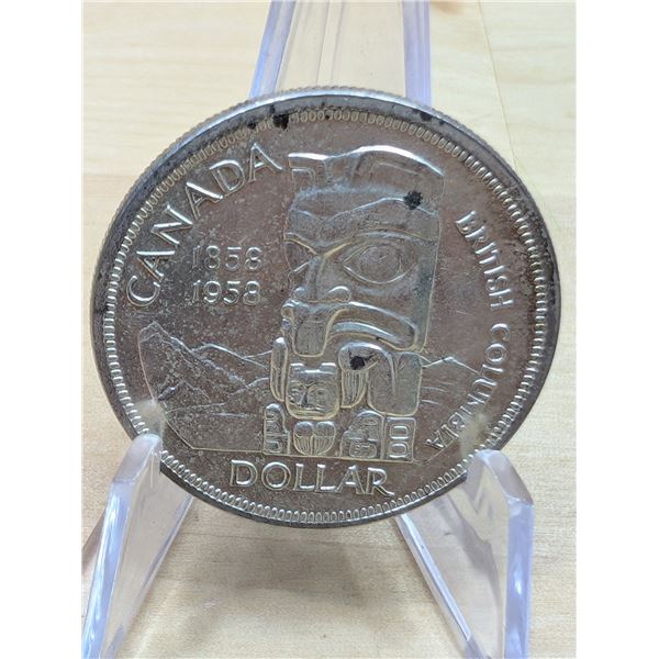 Lot 121-1) 1 Canadian silver Dollar 1958