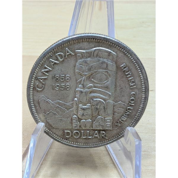 Lot 129-1) 1 Canadian silver Dollar 1958